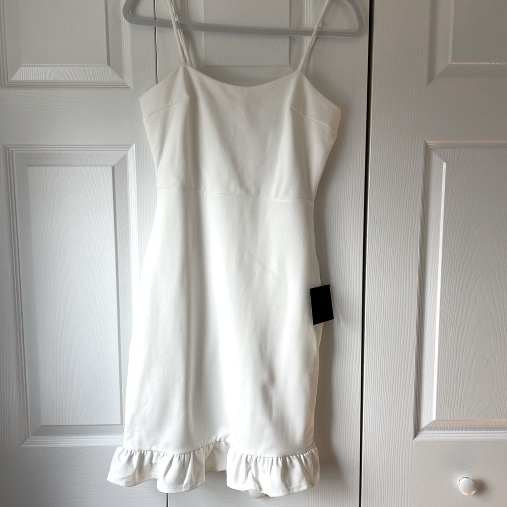 Adorable, flattering white dress from Lulu’s